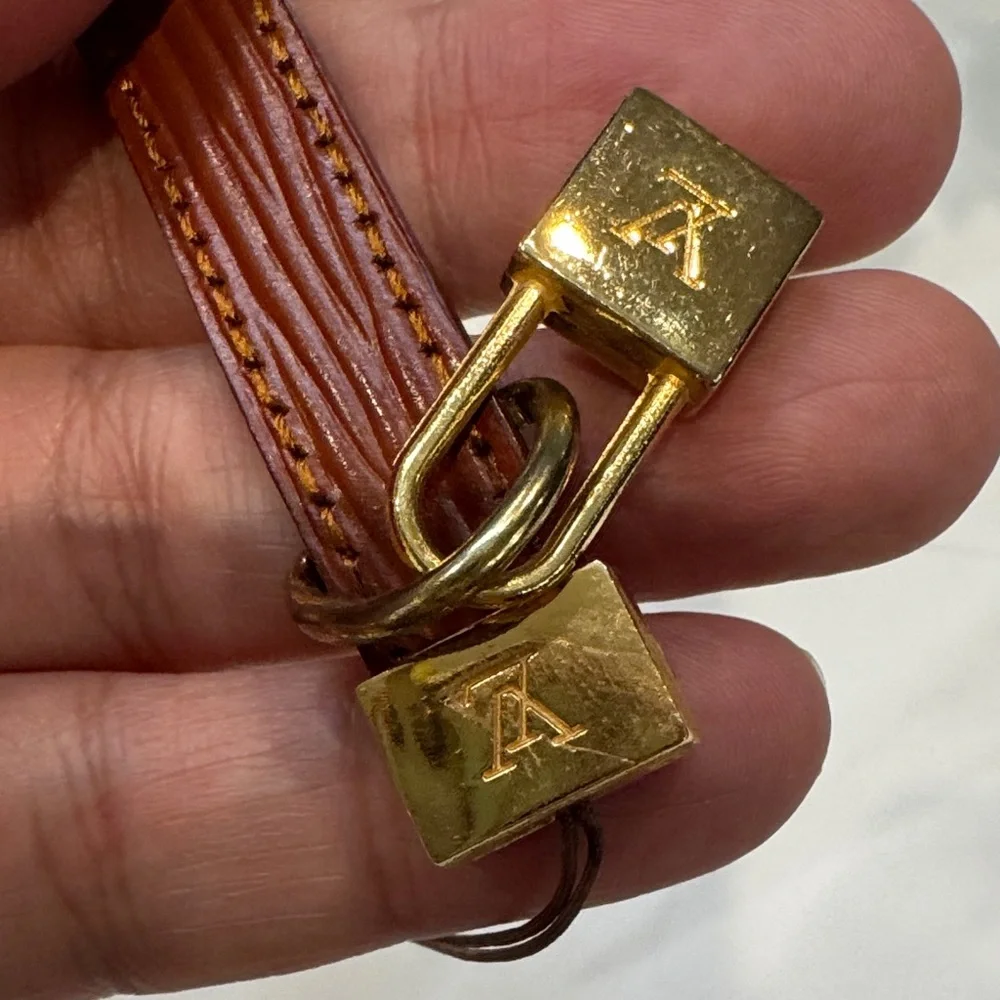 Louis Vuitton Brown Leather Key Holder with Gold Lock